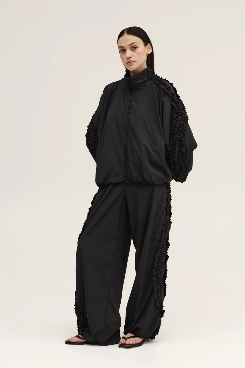 Брюки с поплывшими лампасами UNKE, цвет: Черный, 2602T001N_BL купить онлайн