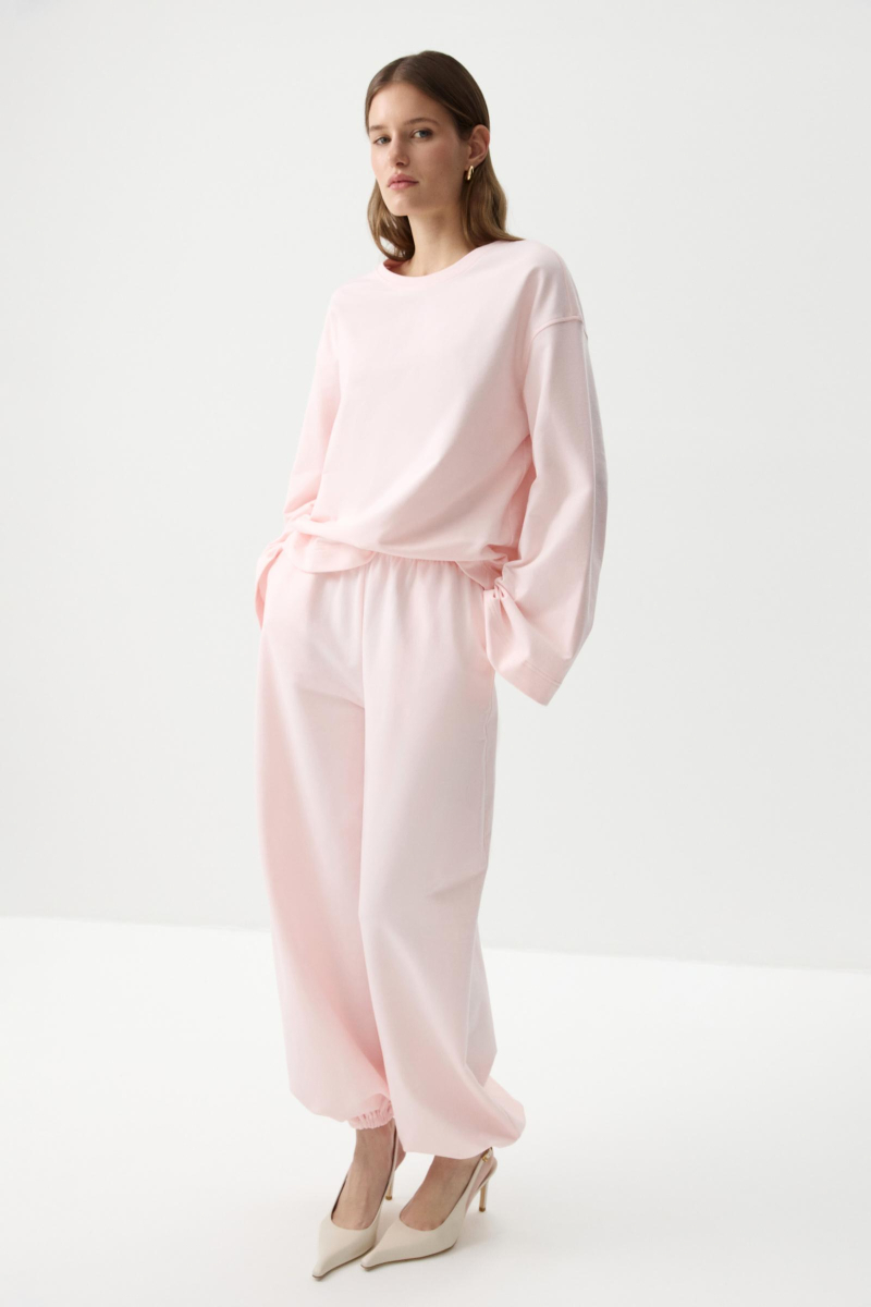 Джоггеры с карманами Charmstore, цвет: розовый, 201-52258-221 купить онлайн