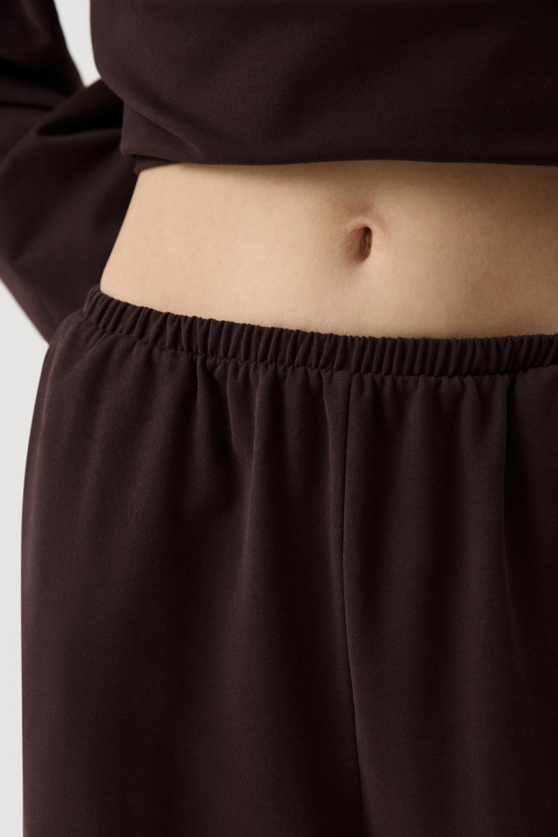 Джоггеры с карманами Charmstore, цвет: коричневый, 201-52258-551 купить онлайн