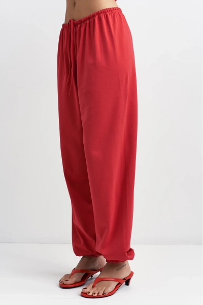 Брюки из кулирки Erist store, цвет: красный,  купить онлайн
