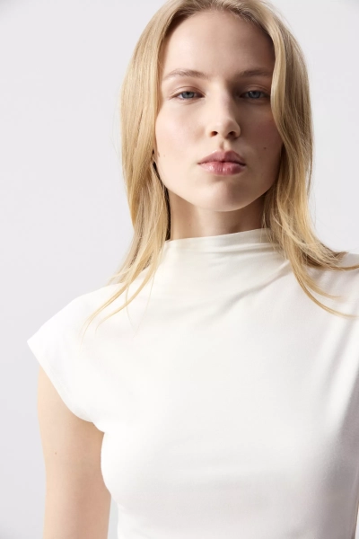 Топ трикотажный со стойкой Charmstore, цвет: ванильный, 214-57265-113 купить онлайн