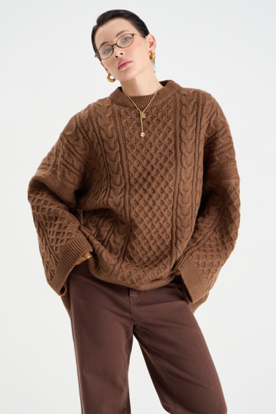 Свитер с косами