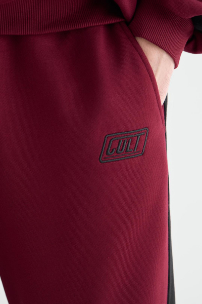 Джоггеры DRIVE CULT, цвет: бургунди,  купить онлайн