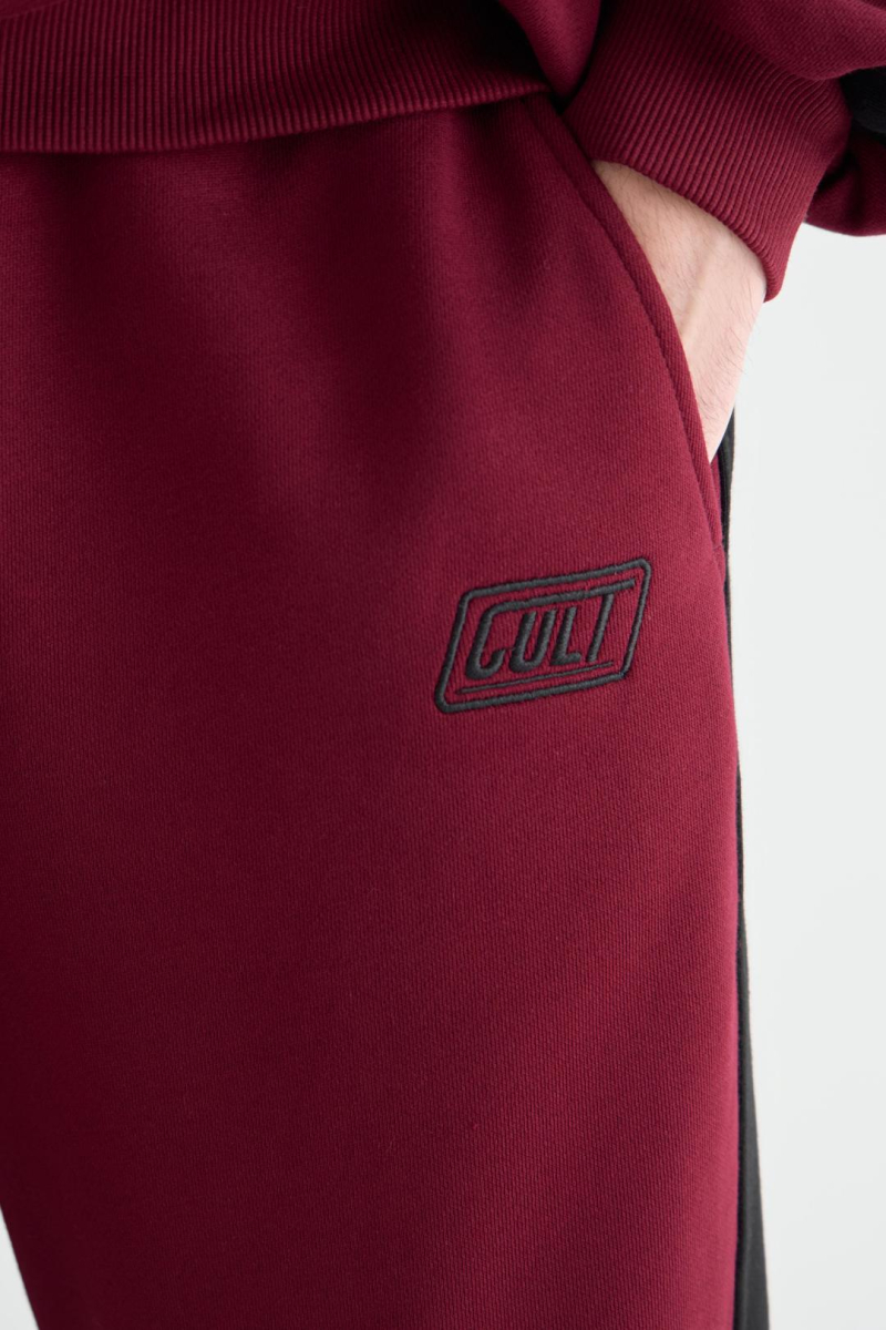 Джоггеры DRIVE CULT, цвет: бургунди,  купить онлайн
